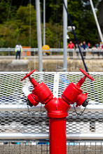 Red Fire Valves In An Industrial Area