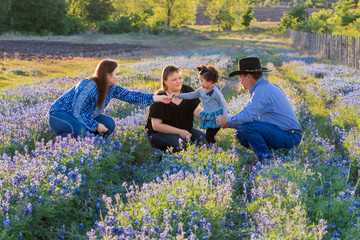 Family in Bluebonnets