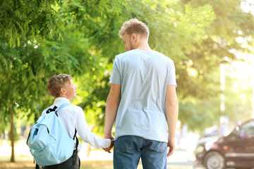 Sticker - Little boy going to school with his father