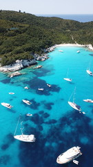 Aerial drone photo of tropical Caribbean bay with white sand beach and beautiful turquoise and sapphire clear sea