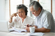© eggeeggjiew - man and woman working in office
