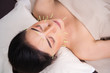 © geargodz - woman undergoing acupuncture treatment on face