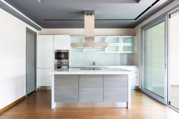 Living room with kitchen island, modern apartment