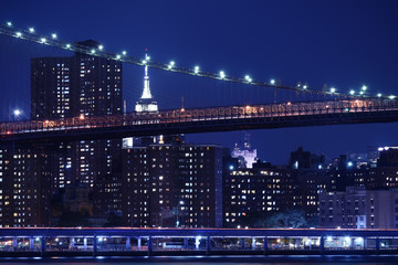 Sticker - Tiers of bridges over the bay and night skyscrapers. New York. night photo. USA.
