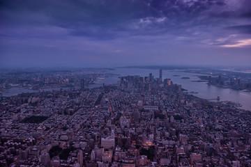 Autocollant - Aerial view of New York city. Dark photo in the evening.