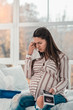 © Viacheslav Yakobchuk - Negative delighted pregnant woman touching her forehead