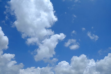 Wall Mural - white clouds with beautiful blue sky background.