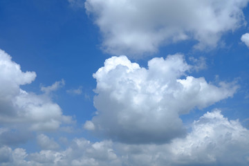 Wall Mural - white clouds with beautiful blue sky background.