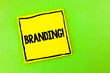© Zofia - Handwriting text Branding Motivational Call. Concept meaning Creating a unique identity for new startup agencies written Yellow Sticky Note Paper the plain background.