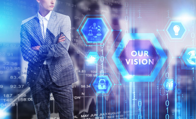 The concept of business, technology, the Internet and the network. A young entrepreneur working on a virtual screen of the future and sees the inscription: Our vision