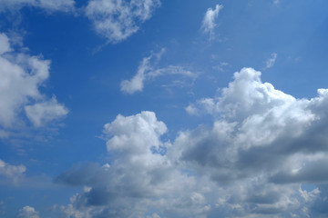 Wall Mural - white clouds with beautiful blue sky background.
