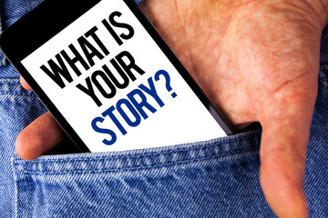 Wall Mural - Writing note showing What Is Your Story Question. Business photo showcasing Telling personal past experiences Storytelling written Mobile phone screen holding by man the Jeans background.