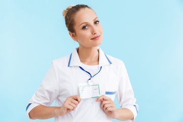 Sticker - Beautiful blonde woman doctor wearing uniform standing