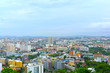 Looking from the height See a city in a tight city with tall buildings and beautiful skies. Is a comfortable view
