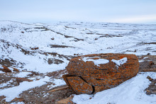 Large Red Boulders At Red Rock Coulee, Alberta, Canada In The Evening On A Cold Winter Day