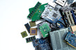 © damrong - Pile of electronic waste, Motherboard computer and cpu microchips  electronic equipment, Printed Circuit Board on white background, E-waste is a problem with environmental concepts should be reused