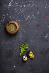 Spices and seasonings, salt on a dark gray background