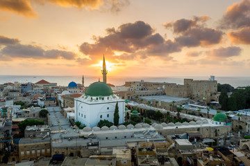 Wall Mural - Aerial summer sunset view of Acco, Acre, Akko medieval old city with green roof Al Jazzar mosque and crusader palace in Israel