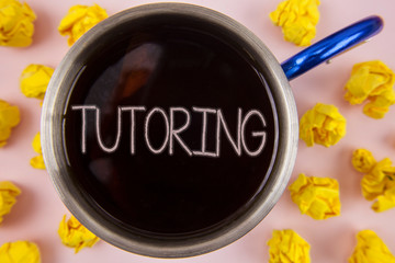 Poster - Writing note showing Tutoring. Business photo showcasing Mentoring Teaching Instructing Preparing Supporting Give lessons written Black Tea in Cup within Paper Balls plain background.