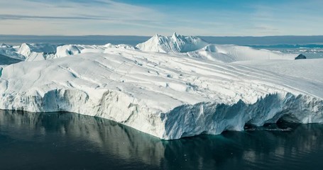 Wall Mural - arctic icebergs in greenland, drone view. global warming concept.
