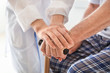 © Pixel-Shot - Hands of elderly man and doctor in clinic, closeup