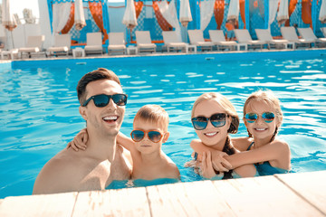 Sticker - Happy family in swimming pool on summer day