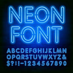 Poster - Neon alphabet font. Blue neon light bulb letters and numbers on brick wall background. Stock vector typeface for your typography design.