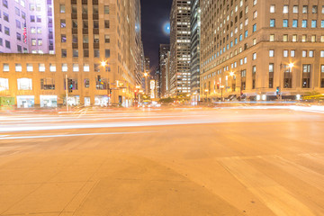 Wall Mural - Wacker Dr street with tall buildings and street light trails in Chicago at night