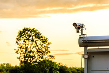 Uk Motorway Traffic Monitor Camera At Sunset