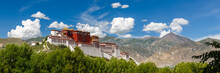 LHASA, TIBET / CHINA - July 31, 2017: Panorama Of Potala Palace - Home Of The Dalai Lama And Unesco World Heritage. Blue Sky, Clouds. Amazing View Of The Ancient Fortress. Center Of Tibetan Buddhism.
