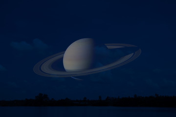Wall Mural - Saturn on night sky back silhouette mountain and river