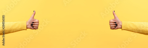 Fotomural thumb up or like sign over trend yellow background, panoramic image