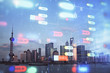 © peshkova - Data theme hologram drawing on city view with skyscrapers background double exposure. Technology concept.