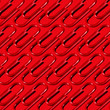 © Eldad Carin Ltd./Stocksy - Red Paper Clip Pattern on Red