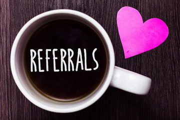 Poster - Handwriting text Referrals. Concept meaning Act of referring someone or something for consultation review Mug coffee lovely thoughts ideas love hart romantic memories brown wood