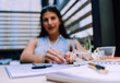 © qunica.com - Blurred photo of young girl while sitting in a restaurant