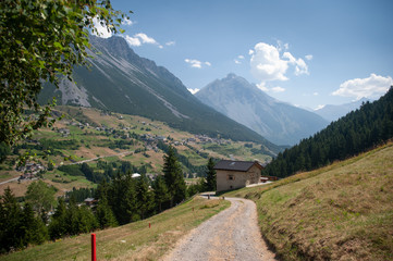 Village in Italian Alps in summer day 