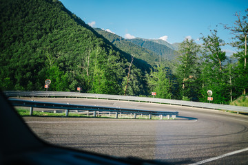 road in mountains summer forest sky