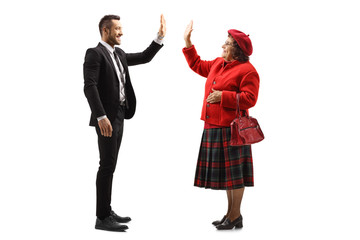 Poster - Businessman gesturing high-five with an elderly lady