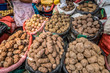 Sacks of different type of potatoes in a Peru marketplace