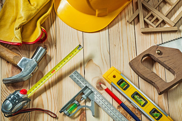 Wall Mural - composition of construction tools  on wooden background