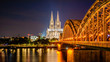 Köln mit Kölner Dom, Hohenzollernbrücke und Rhein bei Nacht