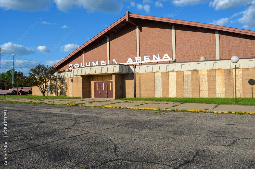 Fridley, Minnesota - June 1, 2012: Abandoned Columbia Arena, an old Ice Hockey and skating rink, was the filming location from the 1990s movie, The Mighty Ducks. The rink has since been demolished