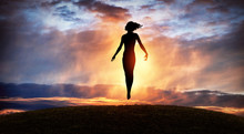 Silhouette Of Woman Rising Into Heaven. Levitation. Have A Positive Mindset.