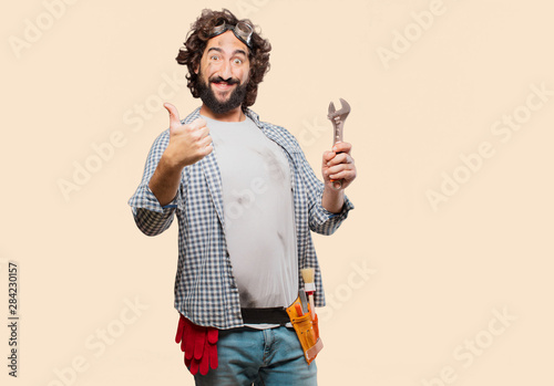 Fotomural househusband handyman with a wrench