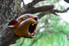 Jaguar Head Carved In Wood Mexican Mayan Crafts On Natural Background.