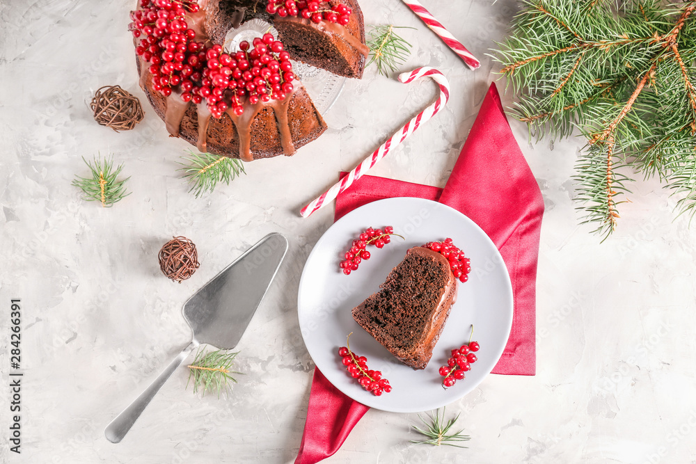Tasty Christmas pie on grey background