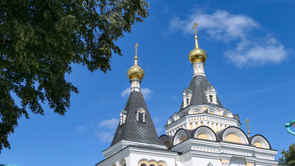 Wall Mural - Golden cupola of Dmitrov Kremlin under summer sky