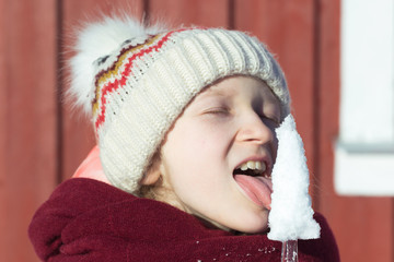 little norwegian girl with an ice floe in hand