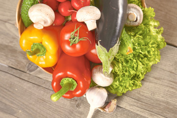 Wall Mural - Vegetables . Fresh Bio Vegetable in a Basket. Over Nature Backg